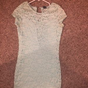 Tight light blue lace dress